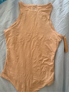 SKIMS Sleeveless Tank Bodysuit in Beige Nude
